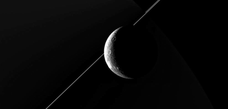 Illustration for article titled Farewell, Dione: Cassini Makes Final Flyby of Saturn's Fourth Largest Moon
